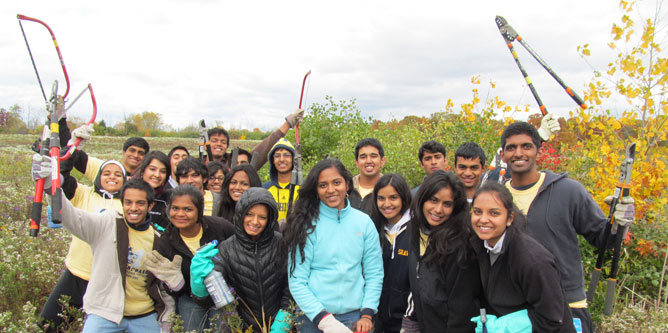 SMLC volunteers celebrate a job well done. Photo by Scott Tyrrell
